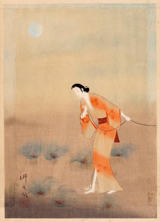 綱を引く女