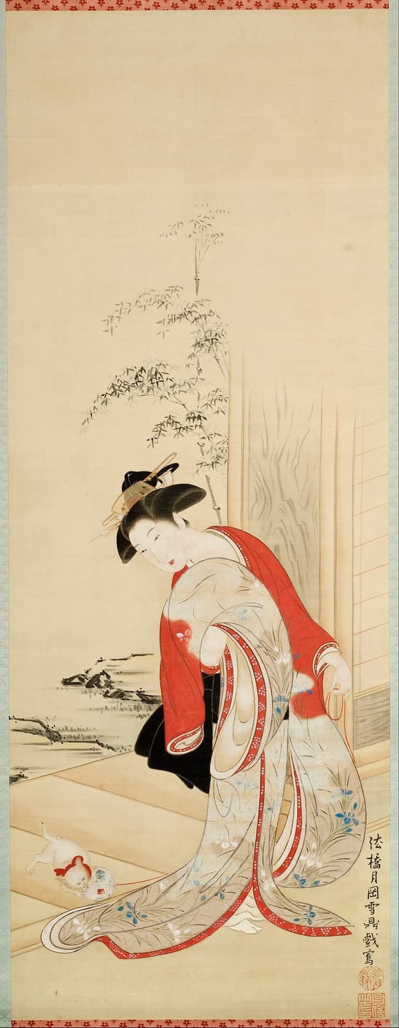 猫と戯れる美人