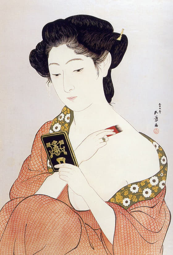 化粧の女