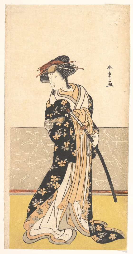刀を持つ中村里好