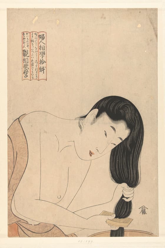 髪を洗う女
