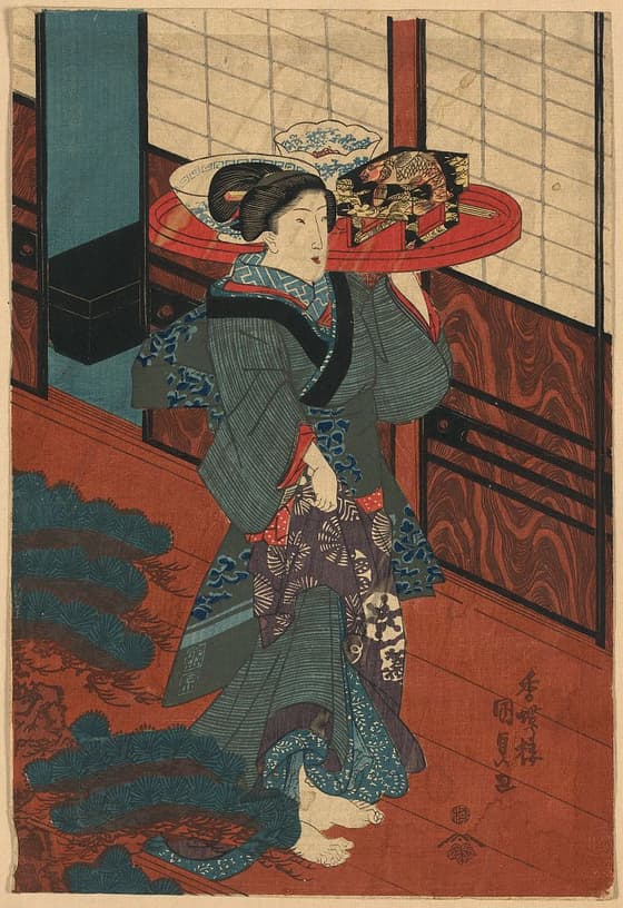 料理を運ぶ仲居