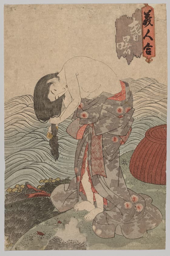 髪を梳く海女